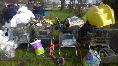 Off our trolleys: litter removed from a small Belfast river by volunteers